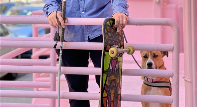 Anthony Ferraro's white cane, skateboard, and dog, the gear behind the adaptive skateboarding TikTok video