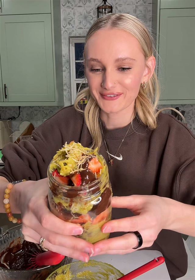 Viral TikTok food trends: a Dubai chocolate strawberry cup layered with pistachio cream and kataifi
