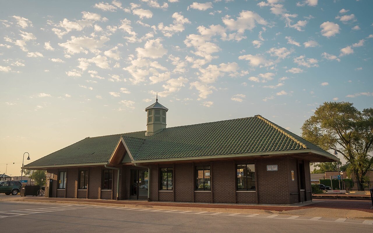 The train station building in Bensenville, Illinois at sunset